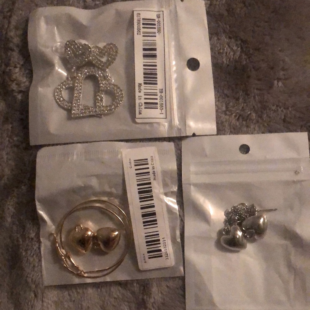 Heart earring lot never been opened